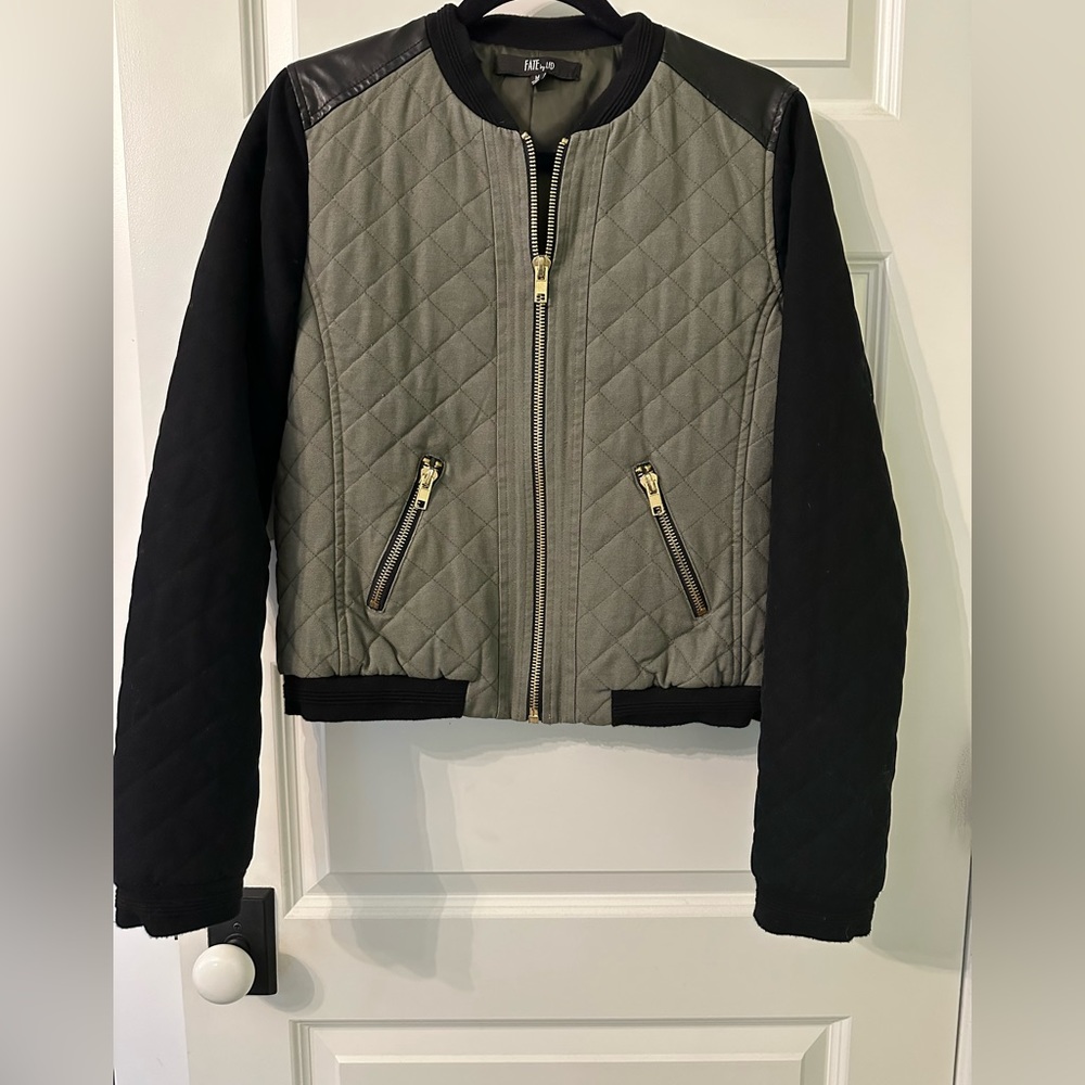 Bomber style quilting jacket with leather trim